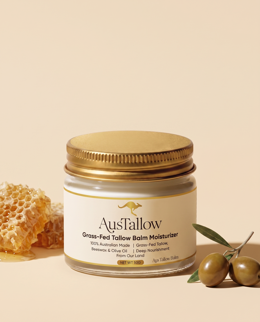 AusTallow Tallow Balm jar with honeycomb and green olives, showing its beeswax and olive oil ingredients