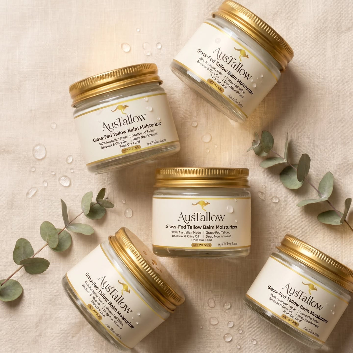 Four jars of AusTallow Tallow Balm with eucalyptus leaves